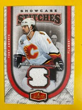 D55792  2006-07 Flair Showcase Stitches #SSTA Tony Amonte
