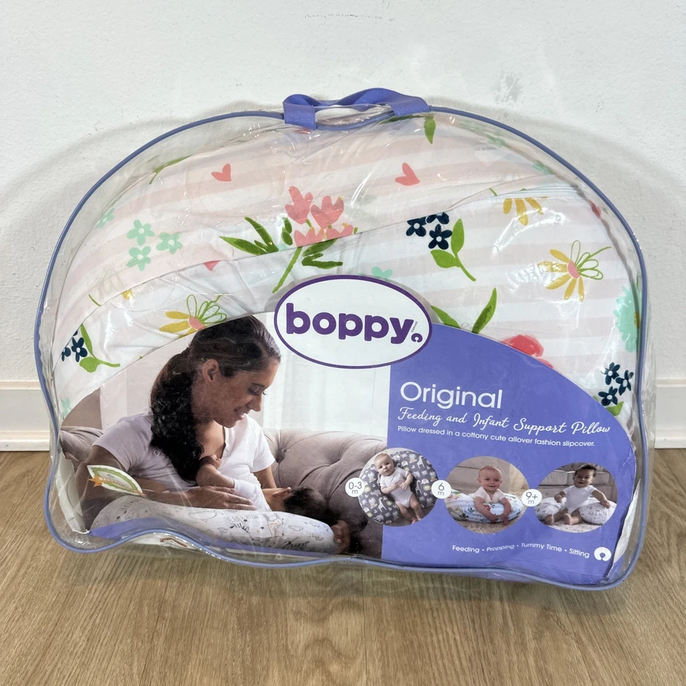 Almohada y posicionador de lactancia Boppy con cuaderno cubierta negra y dorada para animales de zoológico Foto 1 de 4