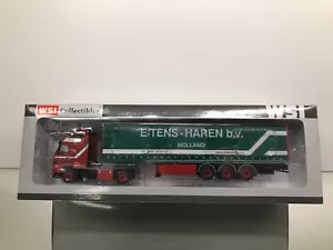 WSI 9194 VOLVO FH GLOBE EITENS HAREN CURTAINSIDE TRAILER -1:50- HIGH QUALITY IB - Imagen 1 de 15