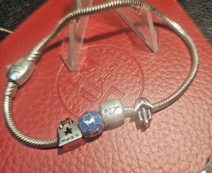 Macy's  bracelet sterling silver with four charms 7" - Picture 1 of 4