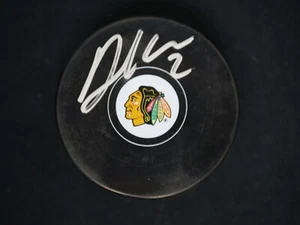 DUNCAN KEITH SIGNED CHICAGO BLACKHAWKS TEAM PUCK WITH BAS COA - Picture 1 of 2