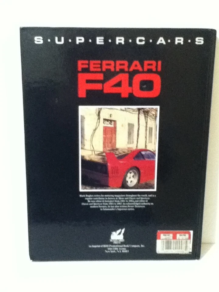 VINTAGE 1990 SUPERCARS FERRARI F40 WRITTEN BY: MARK HUGHES - Image 1 of 4