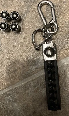 Ford Lincoln logo  Tire Wheel Valve cap Stems & keychain Brand New - Imagem 1 de 4