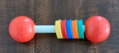 Juguete de plástico vintage con barra de sonajero para bebé años 80 rojo arco iris colorido Foto 1 de 4