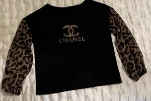 Damenmode Sweatshirt schwarz und Leopardenärmel Größe L - Bild 1 von 5