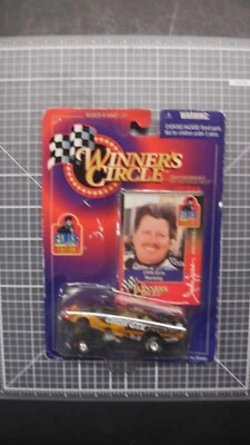 1998 John Force Elvis Ford Mustang Castrol GTX Winners Circle 1/64 Funny Car  - Image 1 of 4