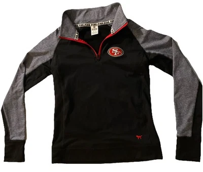 JERSEY VICTORIA’S SECRET ROSA SAN FRANCISCO 49ERS 1/4 CREMALLERA TALLA M Foto 1 de 4