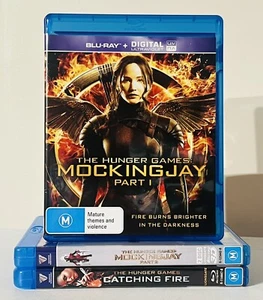 The Hunger Games Blu-Ray DVD Bundle x 3 Mocking Jay Part 1 & 2 Catching Fire - Picture 1 of 4