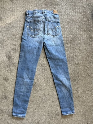 Брюки джеггинсы American Eagle синие следующий уровень эластичные с высоким подъемом размер 2 короткие - Изображение 1 из 4