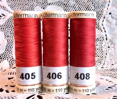 3 NEW different red colors GUTERMANN 100% polyester thread 110 yard spools - Image 1 of 4