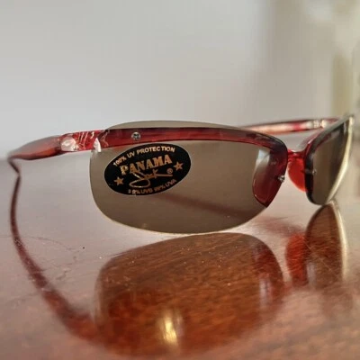 Gafas de sol Panama Jack protección UV de plástico rojo sin marco Foto 1 de 4