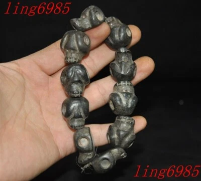 China Hongshan Cultura Meteorito Hierro Tallado Calavera Pulsera Brazalete Cadena de Mano Foto 1 de 4