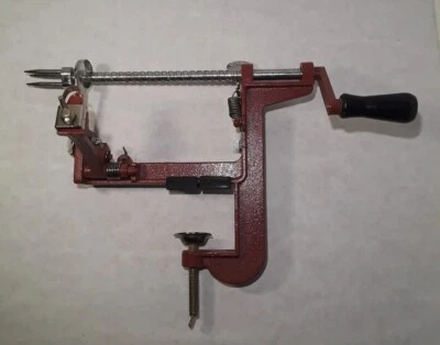 Cortadora progresiva con abrazadera en peladora de manzanas  Foto 1 de 4