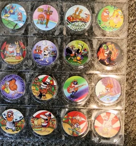 CADBURY 1995 COMPLETE SET SIXTEEN POGS CAPS IN SLEEVE EXCELLENT CONDITION - Picture 1 of 2
