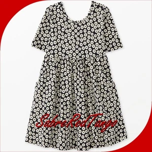 NEU MIT ETIKETT HANNA ANDERSSON SUPERWEICHES SKATER-WIRLKLEID WINZIGE BLÜTEN SCHWARZ 130 8 - Bild 1 von 2
