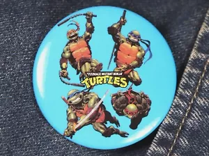 Vintage Teenage Mutant Ninja Turtles fumetti blu bottone spilla posteriore 2" TMNT - Foto 1 di 5
