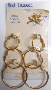 Nächste Ausgabe gekrempelt 7-teiliges Set goldfarbene Ohrringe Bonus Kristall Engel Krawatte Tac neu aus altem Lagerbestand - Bild 1 von 13