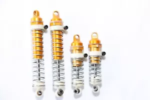 RC10-285 TEAM ASSOCIATED VINTAGE RC10 BUGGY (1980'S) FRONT REAR GOLD SHOCKS - Picture 1 of 1