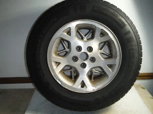 1998 Jeep Grand Cherokee Snowflake Wheel Rim Tire Spare OEM 1993-1998 - Picture 1 of 12
