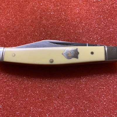 Rough Rider RR603 中号蛇形 Stockman in 440 带黄色合成保护套 — 第 1/4 张图片