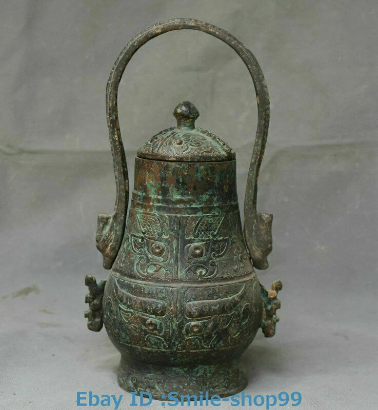 Olla de vino portátil cara de bestia dinastía mercancía de bronce antigua de China de 11,4" Foto 1 de 4