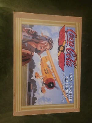 ERTL COCA COLA DIE-CAST 1929 LOCKHEED  AIR EXPRESS YELLOW METAL COIN BANK (1994) - Image 1 of 4