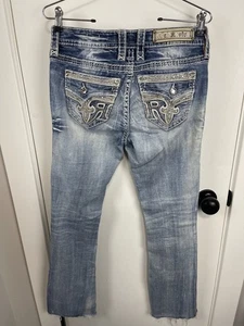 Rock Revival Size 27 Mid Rise Sundee Boot Cut Jeans Light Blue Distressed Spots - Picture 1 of 16