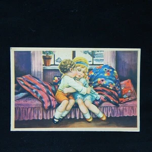 BOY AND GIRL TOGETHER HUGGING WINTER SCENE IN WINDOW BEHIND THEM - Picture 1 of 2