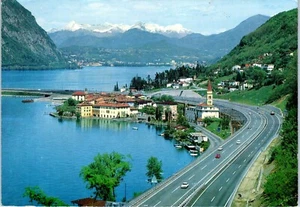 Lake Lugano with the Highway, Bissone, Switzerland Postcard - Picture 1 of 2