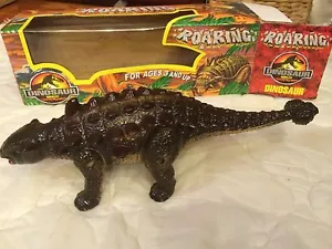 Dinosauro che ruggisce mentre cammina lungo 14" e alto 4-1/2" Jurassic Park - Foto 1 di 3