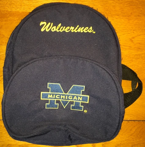 Used 12x10x5 UNIVERSITY OF MICHIGAN WOLVERINES 2 POCKET 2 ZIPPER BACKPACK GOBLUE Cover
