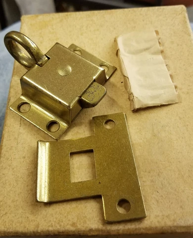transom window russwin cabinet  latch catch new old stock Steel  brass colored Cover