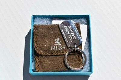 LLAVERO OLÍMPICO ABEDUL PLATEADO MARCADO 2010 NUEVO EN CAJA CON BOLSA Y TARJETA, KCB Foto 1 de 4