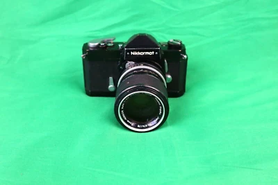 NIKKORMAT FT 35 MM SLR  FILM CAMERA W/ NIKKOR AUTO 1:3.5 F=43MM~F=86MM LENS - Image 1 of 4