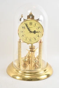 C25O46- Kurfürst Messing Drehpendel Tischuhr mit Glassturz - Bild 1 von 12