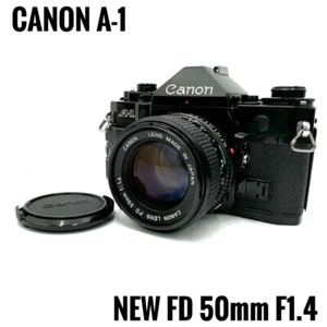 Canon Fotocamera Pellicola A-1 con Obiettivo FD 50mm f/1.4 - Perfettamente Funzionante, Ottima Con - Foto 1 di 10