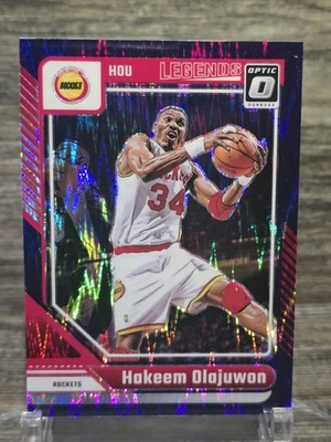 2024-25 Donruss Optic Hakeem Olajuwon Purple Shock Prizm Legends #249 Rockets Foto 1 de 4