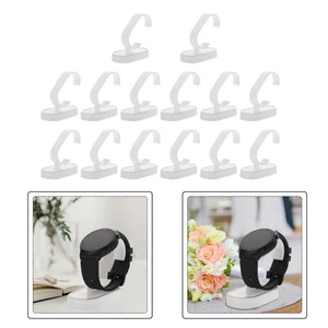 20 piezas Soporte de reloj de mesa Soporte de joyería de muñeca Soporte de reloj de plástico Pulsera - Imagen 1 de 12