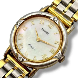 Reloj de cuarzo Seiko para dama esfera concha bisel de diamantes modelo de lujo de dos tonos - Imagen 1 de 10