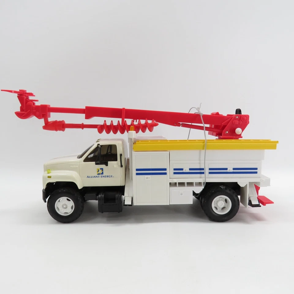 DG Productions- GMC Alliant Energy Utility Digger Truck banco de moedas brinquedo réplica - Imagem 1 de 4