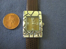 # 702 womens sterling silver AR1A tiger eye dial quartz watch