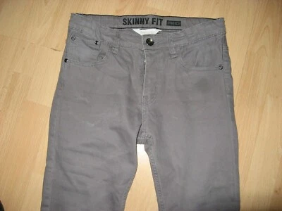 JEANS AJUSTADOS ELÁSTICOS GRIS PÁLIDO H&M PARA NIÑOS APENAS USADOS PIERNA AJUSTADA EDADES 10-11 Foto 1 de 3