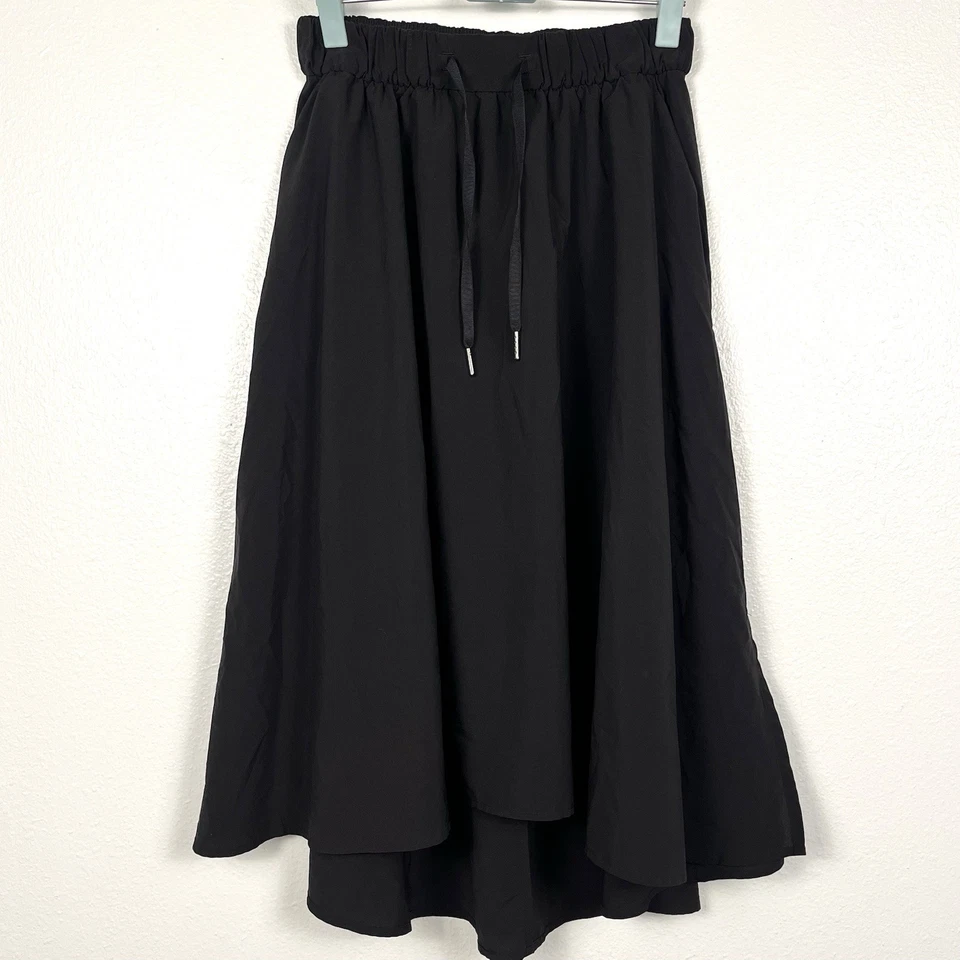 Falda midi Lululemon Time To Flounce negra alta-baja talla 4 Foto 1 de 4
