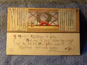 Vintage Christmas Postcard 1913 L.F. Pease Wreath in the Window No. 580 - Picture 1 of 2