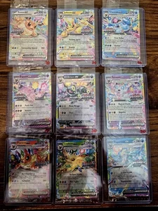 Prismatic Evolutions Surprise Box Stamped EX Promo Cards NM 9/9 Complete Set. 20 - Bild 1 von 1
