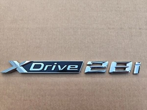 BMW X1 Front Door/Liftgate Chrome X-Drive 28i Emblem OEM 51149450489 - Foto 1 di 3