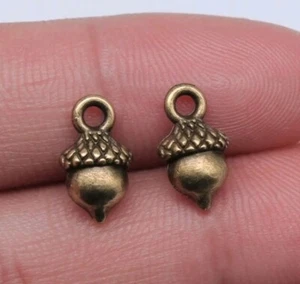 Lot de 4 breloques en métal bronze, petit gland, noisette, 1.3 x 0.7 cm (A08) - Picture 1 of 1