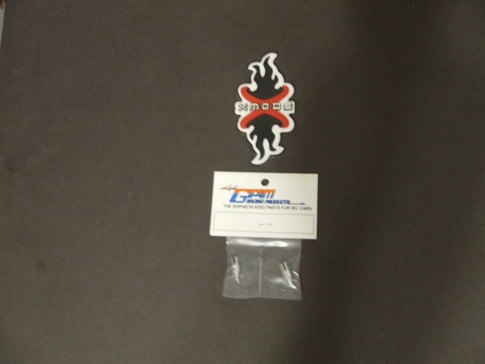 ***XMODS GPM XME039F/4WD FRONT WHEEL SHAFTS WILL WORK WITH 4WD SILVER NEW *** - Image 1 of 1