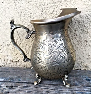 MIDDLE EASTERN WATER PITCHER, EMBOSSED WHITE BRASS VINTAGE FOOTED W/ ICE LIP - Picture 1 of 12