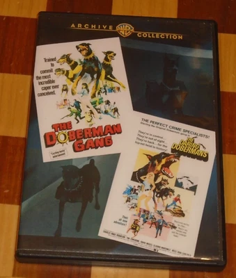 The Doberman Gang (1972) & The Daring Dobermans (1973) [2 DVDs, Warner Archives] - Image 1 of 4